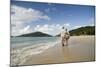 Middle Aged Couple Walking on Lambert Beach, Tortola, British Virgin Islands-Macduff Everton-Mounted Photographic Print