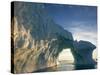 Midnight Sun Lights Arched Iceberg Floating Near Face of Jakobshavn Isfjord, Ilulissat, Greenland-Paul Souders-Stretched Canvas