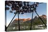 Midnight Sun on Dried Fish Framed by Fishing Village and Peaks, Reine, Nordland County-Roberto Moiola-Stretched Canvas