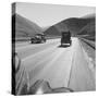 Migrants' Old Car Travels on the Three Lane Highway in California, 1939-null-Stretched Canvas