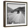 Migrants' Old Car Travels on the Three Lane Highway in California, 1939-null-Framed Photo