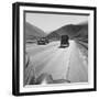 Migrants' Old Car Travels on the Three Lane Highway in California, 1939-null-Framed Photo