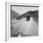 Migrants' Old Car Travels on the Three Lane Highway in California, 1939-null-Framed Photo