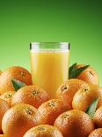 Orange Juice and Fresh Oranges-Miguel G^ Saavedra-Laminated Photographic Print