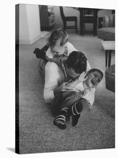 Mike Sibole, Four-Year-Old Recently Blinded to Save His Life, Playing with Father and Brother-Stan Wayman-Stretched Canvas