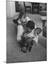 Mike Sibole, Four-Year-Old Recently Blinded to Save His Life, Playing with Father and Brother-Stan Wayman-Mounted Photographic Print