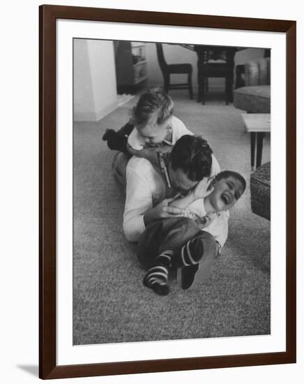 Mike Sibole, Four-Year-Old Recently Blinded to Save His Life, Playing with Father and Brother-Stan Wayman-Framed Photographic Print