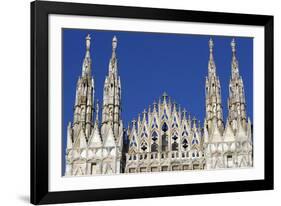 Milan Cathedral. The west facade of the Duomo. The Gothic style cathedral is dedicated to St Mary-Godong-Framed Photographic Print