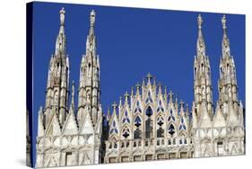 Milan Cathedral. The west facade of the Duomo. The Gothic style cathedral is dedicated to St Mary-Godong-Stretched Canvas