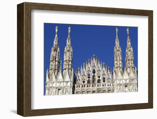 Milan Cathedral. The west facade of the Duomo. The Gothic style cathedral is dedicated to St Mary-Godong-Framed Photographic Print