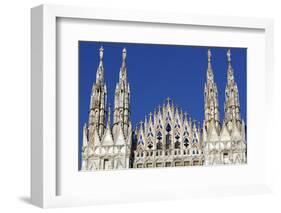 Milan Cathedral. The west facade of the Duomo. The Gothic style cathedral is dedicated to St Mary-Godong-Framed Photographic Print