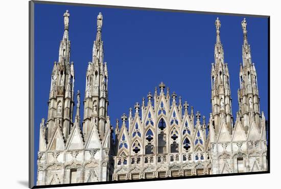 Milan Cathedral. The west facade of the Duomo. The Gothic style cathedral is dedicated to St Mary-Godong-Mounted Photographic Print