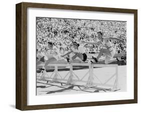 Mildred 'Babe' Didrikson, Running the 80-Meter Hurdles, at the 1932 Olympics-null-Framed Photo