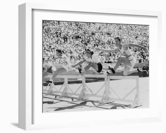 Mildred 'Babe' Didrikson, Running the 80-Meter Hurdles, at the 1932 Olympics-null-Framed Photo