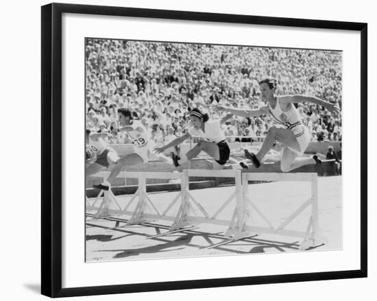 Mildred 'Babe' Didrikson, Running the 80-Meter Hurdles, at the 1932 Olympics-null-Framed Photo