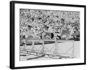 Mildred 'Babe' Didrikson, Running the 80-Meter Hurdles, at the 1932 Olympics-null-Framed Photo