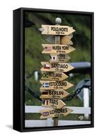 Mileage Sign Pointing Directions in Puerto Williams-Paul Souders-Framed Stretched Canvas