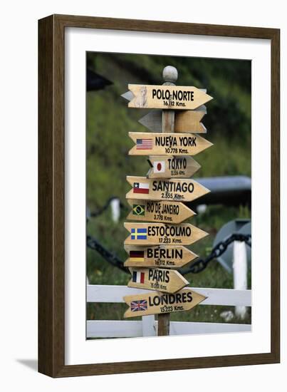 Mileage Sign Pointing Directions in Puerto Williams-Paul Souders-Framed Photographic Print