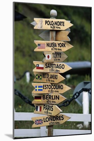 Mileage Sign Pointing Directions in Puerto Williams-Paul Souders-Mounted Photographic Print