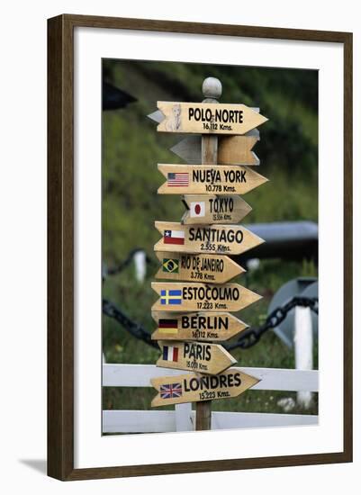 Mileage Sign Pointing Directions in Puerto Williams-Paul Souders-Framed Photographic Print