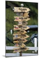Mileage Sign Pointing Directions in Puerto Williams-Paul Souders-Mounted Photographic Print