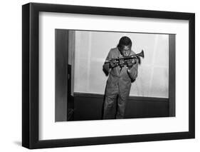 Miles Davis Kissing Trumpet-null-Framed Photo