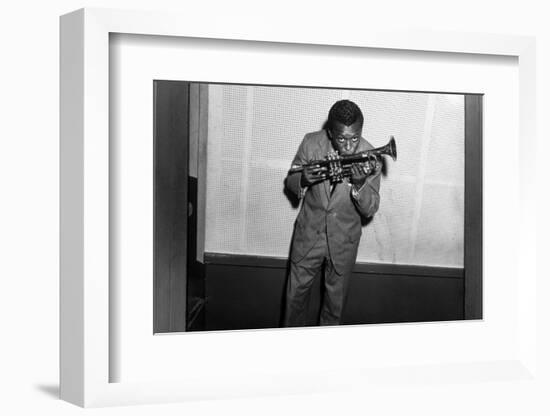 Miles Davis Kissing Trumpet-null-Framed Photo