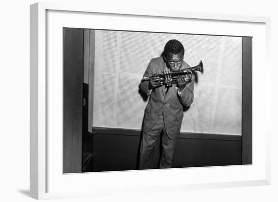 Miles Davis Kissing Trumpet-null-Framed Photo