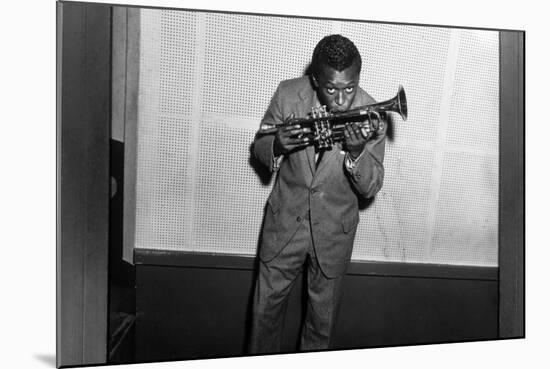 Miles Davis Kissing Trumpet-null-Mounted Photo