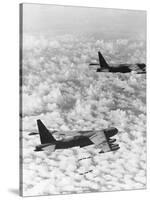 Military Airplane Dropping Bombs in Vietnam-null-Stretched Canvas