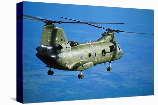 Military Helicopter Flying in Blue Skies-null-Stretched Canvas