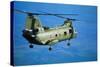 Military Helicopter Flying in Blue Skies-null-Stretched Canvas