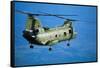 Military Helicopter Flying in Blue Skies-null-Framed Stretched Canvas