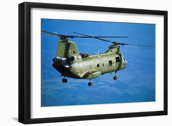 Military Helicopter Flying in Blue Skies-null-Framed Photographic Print