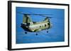 Military Helicopter Flying in Blue Skies-null-Framed Photographic Print