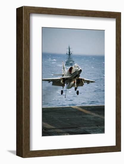 Military Plane Landing on Flight Deck-null-Framed Photographic Print