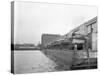 Military Tanks Being Loaded onto a Barge-null-Stretched Canvas