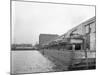 Military Tanks Being Loaded onto a Barge-null-Mounted Photographic Print