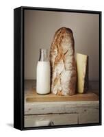 Milk Bottle, Bread and Cheese on a Wooden Cupboard-Joerg Lehmann-Framed Stretched Canvas