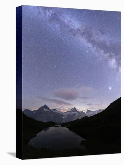 Milky Way over Bachalpsee lake on a summer night, Grindelwald, Jungfrau Region, Bernese Oberland-Roberto Moiola-Stretched Canvas