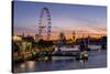 Millenium Wheel (London Eye) with Big Ben on the skyline beyond at sunset, London, England, United -Charles Bowman-Stretched Canvas