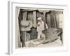 Miller at Work Among the Cogs and Machinery of an Old Mill Crushing Wheat Grain to Make Flour-null-Framed Art Print