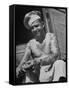 Miller Bros. Circus Chef Sitting and Peeling Potato-Cornell Capa-Framed Stretched Canvas