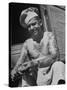 Miller Bros. Circus Chef Sitting and Peeling Potato-Cornell Capa-Stretched Canvas