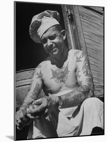 Miller Bros. Circus Chef Sitting and Peeling Potato-Cornell Capa-Mounted Photographic Print