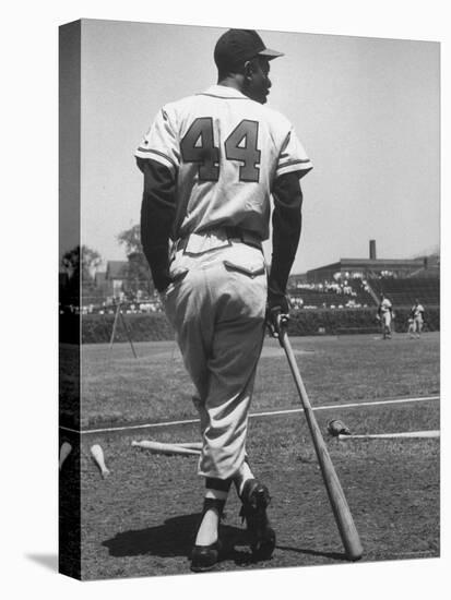 Milwaukee Braves Hank Aaron Leaning on Bat During Baseball Game-George Silk-Stretched Canvas