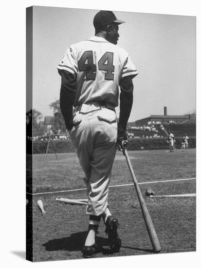 Milwaukee Braves Hank Aaron Leaning on Bat During Baseball Game-George Silk-Stretched Canvas