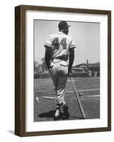 Milwaukee Braves Hank Aaron Leaning on Bat During Baseball Game-George Silk-Framed Premium Photographic Print