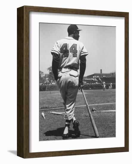 Milwaukee Braves Hank Aaron Leaning on Bat During Baseball Game-George Silk-Framed Premium Photographic Print