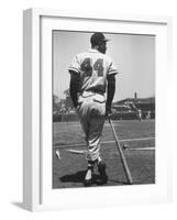 Milwaukee Braves Hank Aaron Leaning on Bat During Baseball Game-George Silk-Framed Premium Photographic Print